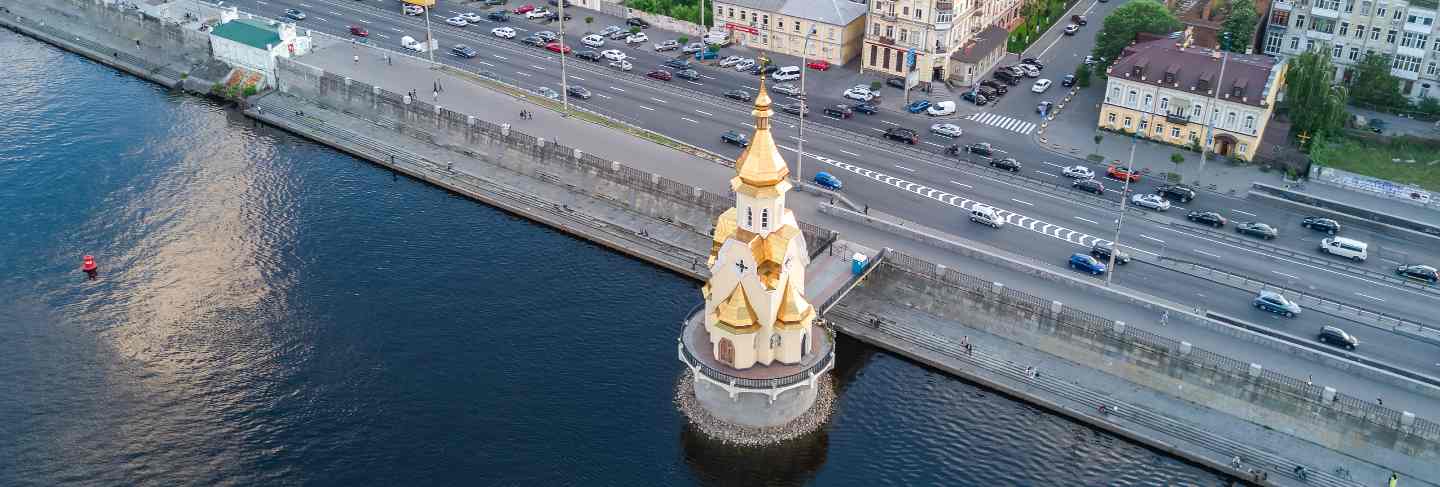 Aerial top view of dnepr river and podol district from above, kiev city, ukraine
