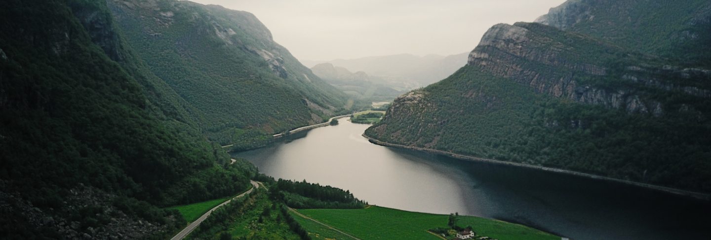 Look from above at river running through the fjords 
